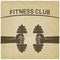 Fitness club symbol. hands with dumbbells old background