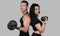 Fitness couple . Sporty couple posing on a background