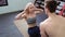 Fitness couple workout - fit man and woman train in gym