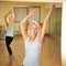 Fitness dance class aerobics. Women dancing happy energetic in g