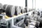 Fitness equipment dumbells on the rack with blur gym studio background