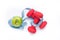 Fitness equipment. Healthy food. Apple, dumbbells and measuring tape on white background. View from above