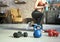 Fitness equipments at home. Focus on fitness tools, barbell and kettlebell. Concept about home workout, fitness, sport and health