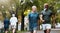 Fitness, exercise and men walking together at community park while talking and doing cardio training outdoor in nature