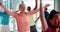 Fitness, exercise and senior people in yoga class for stretching, training and cardio workout in gym. Sports, retirement