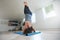 Fitness female practicing Salamba Sirsasana pose