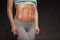 Fitness female woman with muscular body, do her workout, abs, abdominals