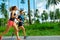 Fitness. Fit Athletic Couple Running. Runners Jogging. Sports. H