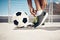 Fitness, football and feet with sport shoes standing with ball for a soccer game in summer ready to score goal. Exercise