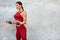 Fitness Girl Portrait. Workout With Dumbbells Against Concrete Background. Sexy Sporty Woman In Fashion Sportswear.