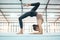 Fitness, gymnastics and flexibility with a black woman training in a gym for an olympics competition. Exercise, workout