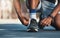 Fitness, hands or black man tie shoes lace before start of running exercise, fitness training or sports workout. Health