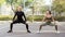 Fitness and jogging. Attractive woman and man exercising outdoor