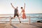 Fitness, jump and portrait of a couple at beach for training fun, support and celebration of goal. Energy, happy and