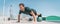 Fitness man banner panorama. Athlete strength training pushup balancing legs on medicine ball for advanced core body