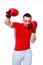 Fitness man punching with red boxing gloves