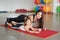 Fitness mother and child. Sports activities with children. Fitness center. Mom and baby gymnastics, yoga exercises. Health and