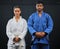 .Fitness, motivation and discipline karate training with a student and teacher standing proud in a center or dojo. Young