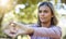 Fitness, nature and woman doing a stretching exercise before a workout in the park or garden. Sports, wellness and