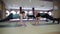Fitness parners in sportswear doing exercises at gym. Fitness sport gym concept. ABS training