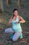 Fitness pregnant woman measuring heart rate