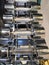 Fitness room, set of steel dumbbells of different weights