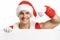 Fitness Santa Claus with a banner sales