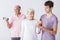 Fitness seniors exercising with trainer