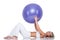 Fitness series - Young woman with purple ball