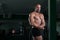 Fitness Shaped Muscle Man Posing In Dark Gym