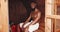 Fitness, smile and black man sweating in sauna of gym to relax for health, wellness or detox. Portrait, spa and bathroom