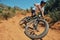 Fitness, speed and extreme sports with man on mountain bike for adventure, cycling and adrenaline junkie. Exercise, risk