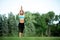 Fitness sport beauty girl doing yoga, fitness and stretching exercise in the park, outdoor