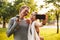 Fitness sport loving couple holding bottle with water.