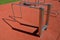 Fitness sports fields with stainless steel tools resemble torture tools with chains and handles. soft rubber surface sports ground