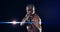 Fitness, sports and a serious boxing black man getting ready for a fight in studio on a dark background with flare