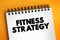 Fitness Strategy - capability of the mind to generate insights and set direction that leads to advantage, text concept on notepad