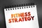 Fitness Strategy - capability of the mind to generate insights and set direction that leads to advantage, text concept on notepad