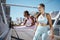 Fitness, stretching and friends women doing workout training together outdoor on urban city bridge, happy with health