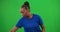 Fitness, water and woman in a studio with green screen doing a workout with weights for health. Sports, training and