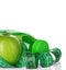 Fitness, weight loss concept with green apples, bottle of drinking water and tape measure