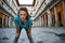 Fitness woman catching breathe near uffizi gallery in florence,