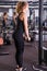 Fitness woman doing exercise workout Triceps Push down at gym