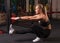 Fitness woman doing pistol squat