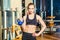 Fitness woman exercising crossfit holding