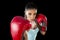 Fitness woman with girl red boxing gloves posing in defiant and competitive fight attitude