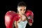 Fitness woman with girl red boxing gloves posing in defiant and competitive fight attitude