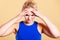 Fitness woman with headache migraine pain