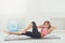 Fitness woman lying doing crunches barefoot