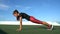 Fitness woman planking doing yoga plank pose for core strength training